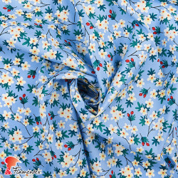 Tejido de algodón estampado de flores.