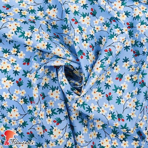 Tejido de algodón estampado de flores.