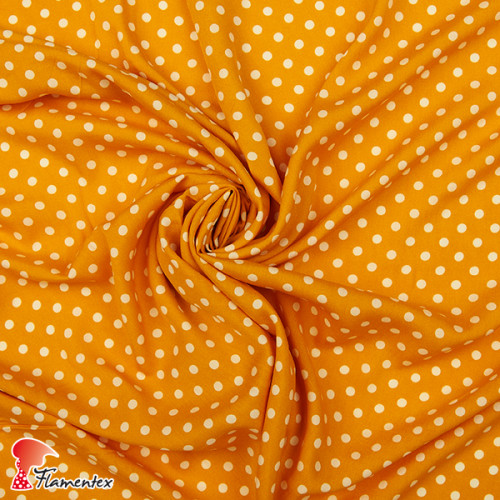 Viscosa. Tejido fino con mucha caída estampado lunares de 0,60 cms.