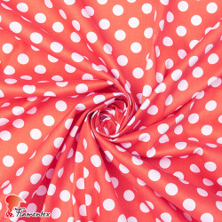 Tejido de algodón con estampado de lunares de 2 cm.