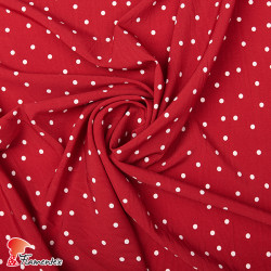 Tejido de crespón tipo georgette. Estampado de lunares de 0,70 cms.