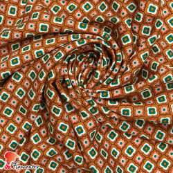 Viscosa. Tejido fino con mucha caída. Estampado geométrico de flores pequeñas.