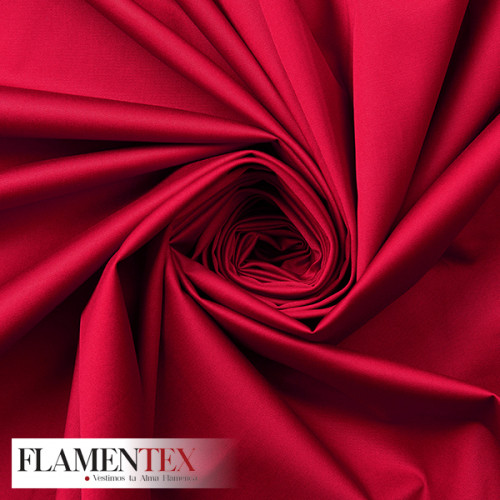 Tejido satinado elástico.