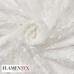 Tejido precioso de tul bordado.