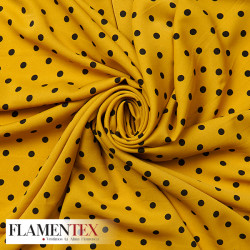 Tejido de crespón suave con elastano. Estampado de lunares de 0,80 cm.
