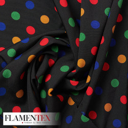 Tejido suave con elastano. Estampado de lunares de colores de 1,50 cm.