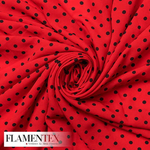 Tejido finito estampado con lunares de 0,60 cm.