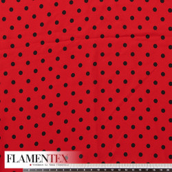 Tejido finito estampado con lunares de 0,60 cm.