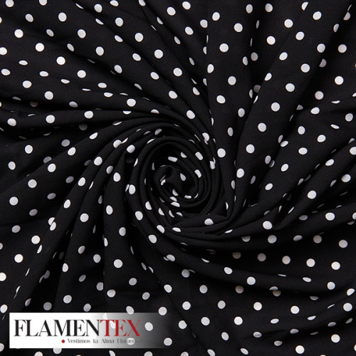 Tejido finito estampado con lunares de 0,60 cm.
