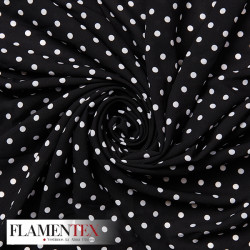 Tejido finito estampado con lunares de 0,60 cm.