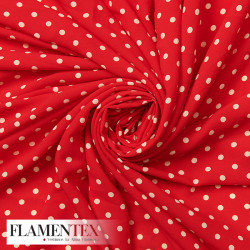Tejido tipo georgette. Estampado de lunares de 0,50 cm.