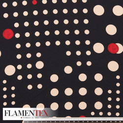 Tejido tipo georgette con estampado de lunares de diferentes medidas.