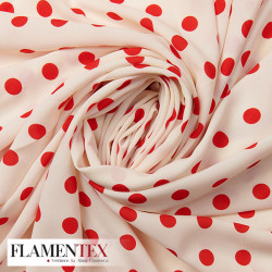 Tejido tipo georgette un poco más tupido y algo elástico. Estampado de lunares de 1,50 cm.