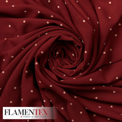 Tejido tipo georgette un poco más tupido y algo elástico. Estampado de lunares 0,50 cm.