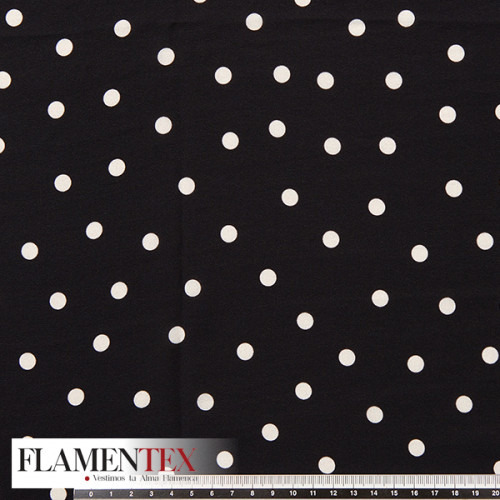 Tejido finito estampado con lunares de 0,80 cm.