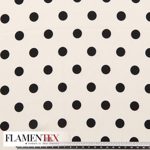 Tejido tipo georgette. Estampado de lunares de 1,50 cm.