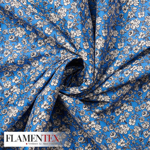 Tejido de popelín de algodón suave estampado con florecitas.