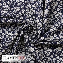 Tejido de popelín de algodón suave estampado con florecitas.