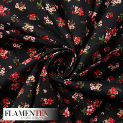 Tejido de popelín de algodón suave estampado con florecitas.