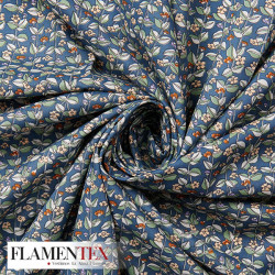 Tejido de popelín de algodón suave estampado con florecitas.