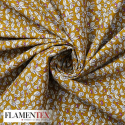 Tejido de popelín de algodón suave estampado con florecitas.