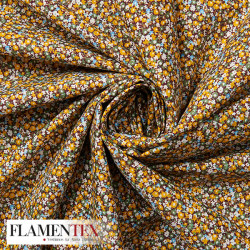 Tejido de popelín de algodón suave estampado con florecitas.