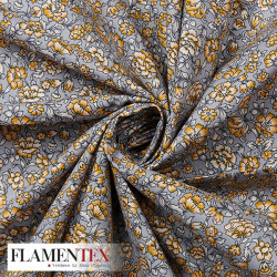 Tejido de popelín de algodón suave estampado con florecitas.