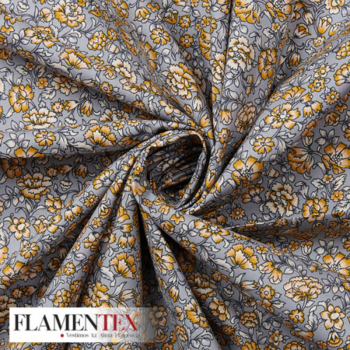 Tejido de popelín de algodón suave estampado con florecitas.