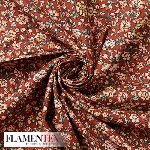 Tejido de popelín de algodón suave estampado con florecitas.
