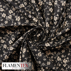 Tejido de popelín de algodón suave estampado con florecitas.