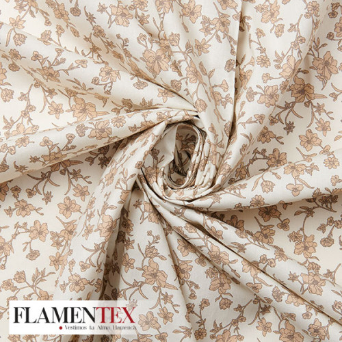 Tejido de popelín de algodón suave estampado con florecitas.
