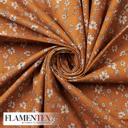 Tejido de popelín de algodón suave estampado con florecitas.