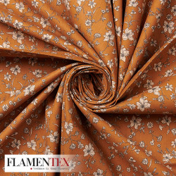 Tejido de popelín de algodón suave estampado con florecitas.