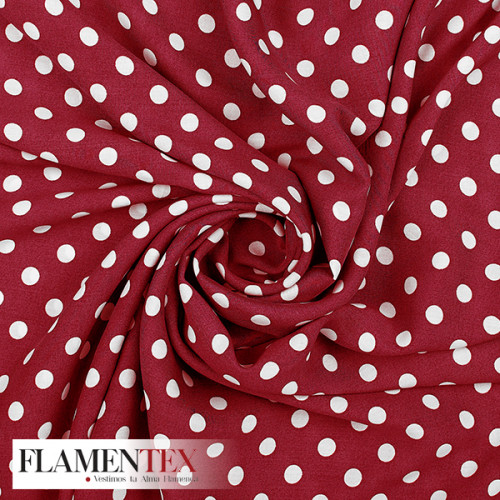 Viscosa. Tejido fino con mucha caida estampado lunares de 0,90 cms.