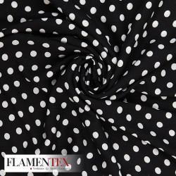 Viscosa. Tejido fino con mucha caida estampado lunares de 0,90 cms.