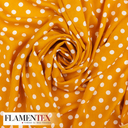 Viscosa. Tejido fino con mucha caida estampado lunares de 0,90 cms.