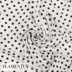 Viscosa. Tejido fino con mucha caida estampado lunares de 0,90 cms.