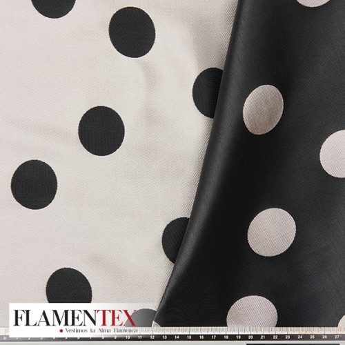 Tejido de Jacquard doble cara. con lunares de 3,75 cm.