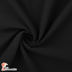 JULIETA. Plain polyester fabric with spandex, ideal for trousers. Summer item.