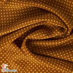 NATASHA  TOPO PQ. Tela de crespón con mucha caída, perfecta para trajes de flamenca. Estampado de lunares pequeños de 0,40 cm.