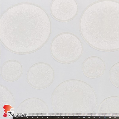 FIJI. Tejido de gasa bordado con lunares irregulares.