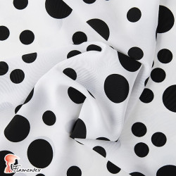 NATASHA TOPO IRREGULAR GR. Drape crêpe fabric. Normally used for flamenco dresses. Irregular polka dot.